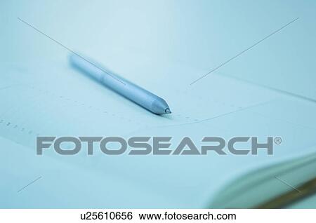 A notebook and a pen View Large Photo Image Stock Photograph - A notebook and a pen. Fotosearch