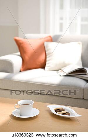 Afternoon tea and biscuits in living room View Large Photo Image Stock Image - Afternoon tea and biscuits in living room. Fotosearch