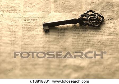 Antique key on a newspaper View Large Photo Image Stock Image - Antique key on a newspaper. Fotosearch