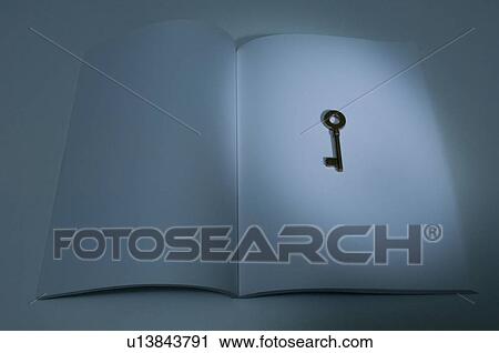 Antique key on a notebook View Large Photo Image Stock Image - Antique key on a notebook. Fotosearch