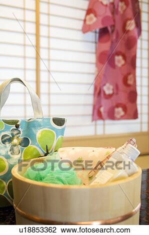 Bamboo bucket of bath products in a health spa with Yukata hanging in the background View Large Photo Image Stock Image - Bamboo bucket of bath products in a health spa with Yukata hanging in the background. Fotosearch