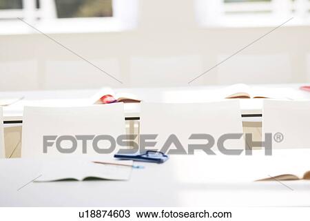 Books and stationery arranged in school classroom View Large Photo Image Stock Image - Books and stationery arranged in school classroom. Fotosearch