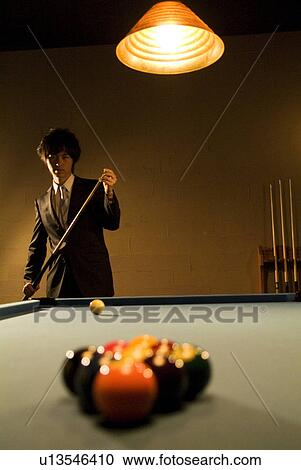 Businessman playing pool View Large Photo Image Stock Image - Businessman playing pool. Fotosearch