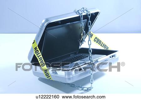 Case with laptop covered in chains and cordon tape View Large Photo Image Stock Image - Case with laptop covered in chains and cordon tape. Fotosearch