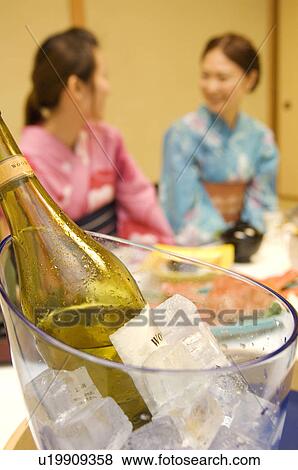 Champagne in ice bucket View Large Photo Image Stock Photo - Champagne in ice bucket. Fotosearch