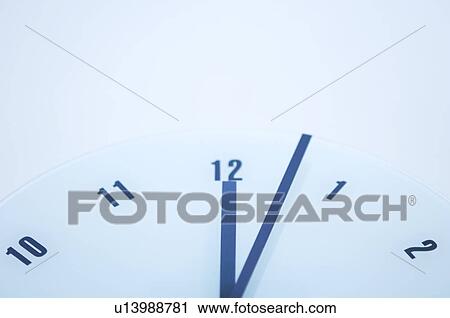 Stock Image - Clock reading 12: 02. Fotosearch
