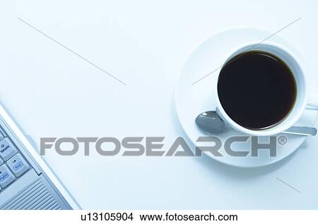 Coffee on office desk View Large Photo Image Picture - Coffee on office desk. Fotosearch
