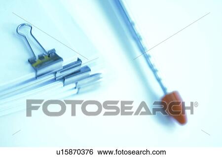 Data held together with a clip View Large Photo Image Stock Photograph - Data held together with a clip. Fotosearch