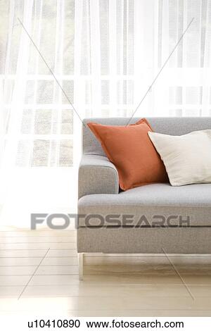 Stock Image - Grey sofa in living room. Fotosearch
