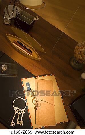 Keys and mail on desk View Large Photo Image Stock Photography - Keys and mail on desk. Fotosearch