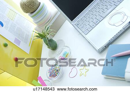 Laptop and notebook on desk View Large Photo Image Stock Image - Laptop and notebook on desk. Fotosearch
