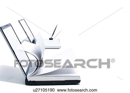 Stock Image - Laptop computers combined with books and fountain pen. Fotosearch