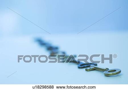 Stock Photo - Line of antique keys. Fotosearch