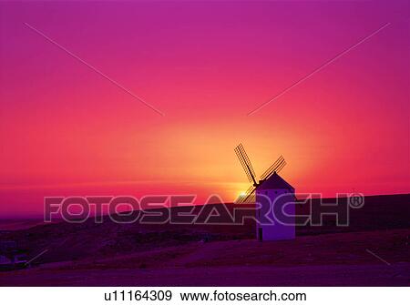 Majestic sunset behind windmill View Large Photo Image Stock Photo - Majestic sunset behind windmill. Fotosearch
