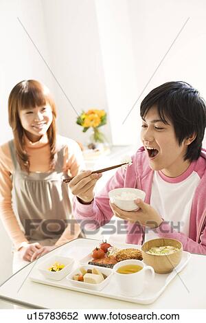 Man having a meal in his hospital bed View Large Photo Image Stock Image - Man having a meal in his hospital bed. Fotosearch