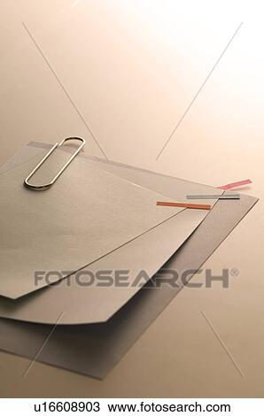 Memo held together with a paper clip View Large Photo Image Stock Image - Memo held together with a paper clip. Fotosearch