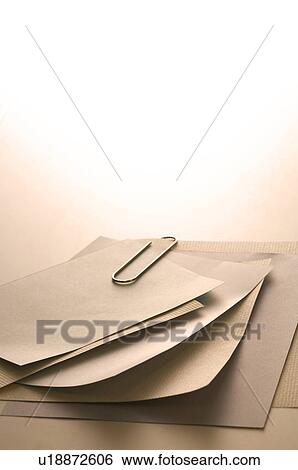Stock Photograph - Memo held together with a paper clip. Fotosearch