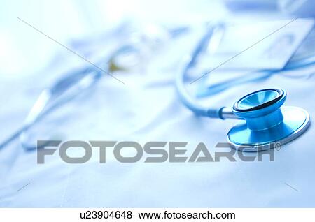 Stock Photo - Nurse uniform, a document and a stethoscope. Fotosearch