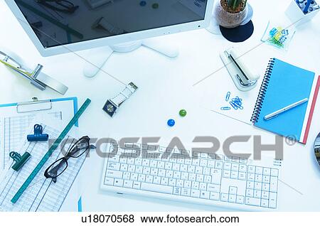 Office supplies on desk with computer View Large Photo Image Stock Photo - Office supplies on desk with computer. Fotosearch