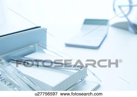 Pen and note pad on desk View Large Photo Image Stock Photo - Pen and note pad on desk. Fotosearch