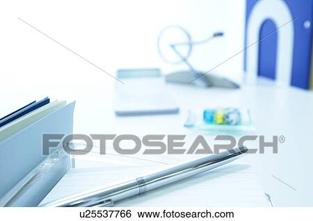 Pen and note pad on desk View Large Photo Image Stock Photograph - Pen and note pad on desk. Fotosearch