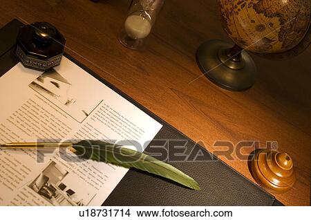 Quill pen and document on desk View Large Photo Image Picture - Quill pen and document on desk. Fotosearch
