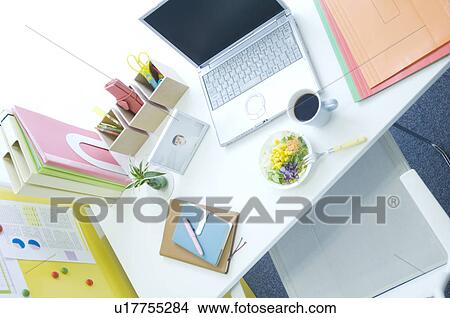 Picture - Salad, coffee cup and laptop on desk. Fotosearch