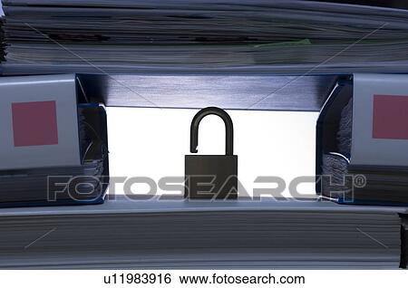 Stock Photograph - Stack of ringbinders holding up a padlock. Fotosearch