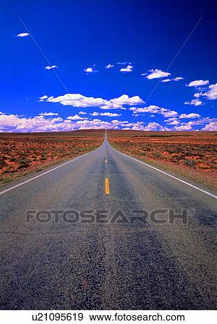 Straight road through landscape View Large Photo Image Stock Photo - Straight road through landscape. Fotosearch