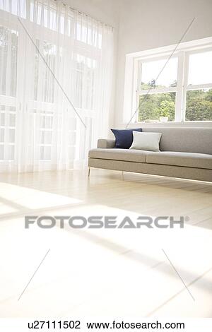 Stock Image - Sunny living room. Fotosearch