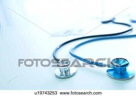 Stock Image - Two stethoscopes and two name tags. Fotosearch