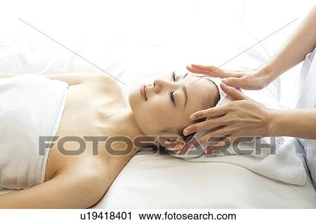 Stock Image - Woman receiving a massage. Fotosearch