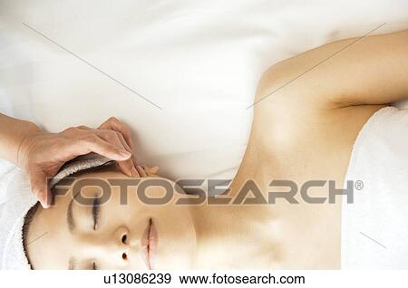 Woman receiving a massage View Large Photo Image Stock Photo - Woman receiving a massage. Fotosearch
