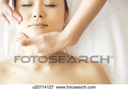 Woman receiving a massage View Large Photo Image Stock Photo - Woman receiving a massage. Fotosearch