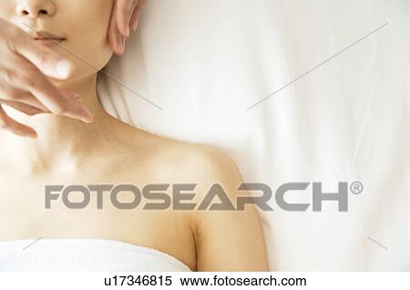 Stock Photography - Woman receiving a massage. Fotosearch