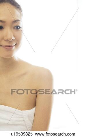 Stock Photography - Woman relaxes after her massage. Fotosearch