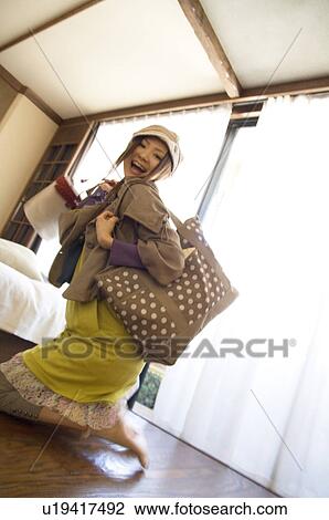 Woman with travel bags View Large Photo Image Stock Image - Woman with travel bags. Fotosearch