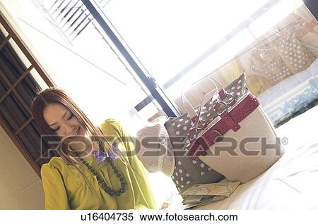 Woman with travel bags View Large Photo Image Stock Photography - Woman with travel bags. Fotosearch