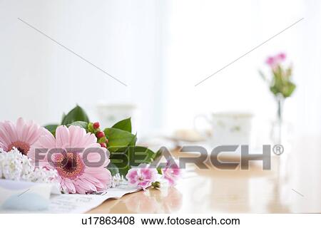 Stock Photo - Afternoon tea on a living room table. Fotosearch