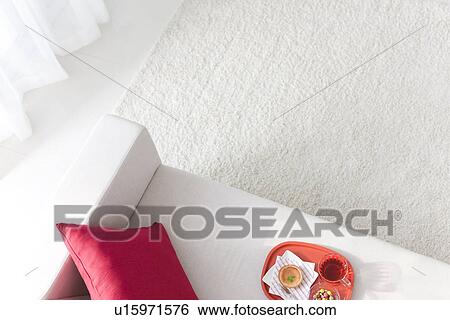 Afternoon tea served in a living room View Large Photo Image Stock Photograph - Afternoon tea served in a living room. Fotosearch