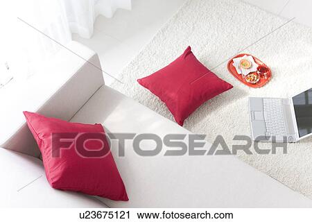 Afternoon tea tray on living room floor next to a laptop View Large Photo Image Stock Image - Afternoon tea tray on living room floor next to a laptop. Fotosearch