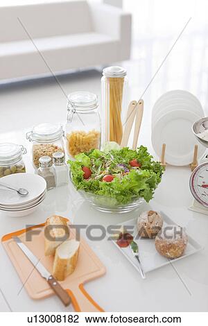 Assortment of food on table View Large Photo Image Stock Image - Assortment of food on table. Fotosearch