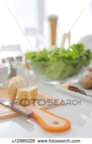 Assortment of food on table View Large Photo Image Stock Photograph - Assortment of food on table. Fotosearch
