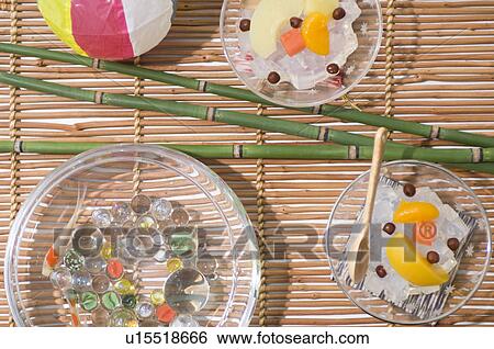 Bamboo, beach ball, fish bowl and cold fruit snacks on a tatami mat View Large Photo Image Stock Photograph - Bamboo, beach ball, fish bowl and cold fruit snacks on a tatami mat. Fotosearch