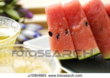 Barley tea and slices of watermelon View Large Photo Image Stock Image - Barley tea and slices of watermelon. Fotosearch