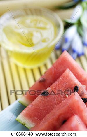 Stock Photo - Barley tea and slices of watermelon. Fotosearch