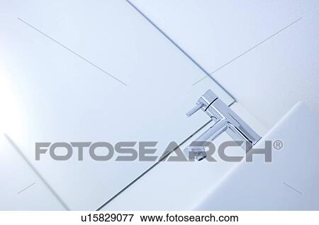 Stock Photo - Bathroom sink and faucet. Fotosearch