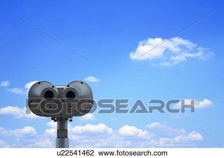 Binoculars and a blue sky View Large Photo Image Stock Image - Binoculars and a blue sky. Fotosearch