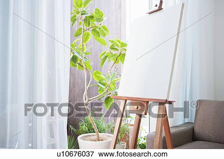 Blank canvas on an easel View Large Photo Image Stock Photo - Blank canvas on an easel. Fotosearch