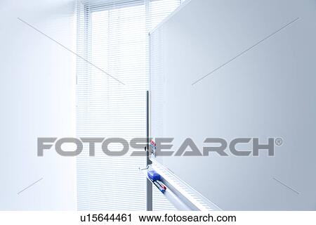 Blank whiteboard in empty office room View Large Photo Image Stock Image - Blank whiteboard in empty office room. Fotosearch